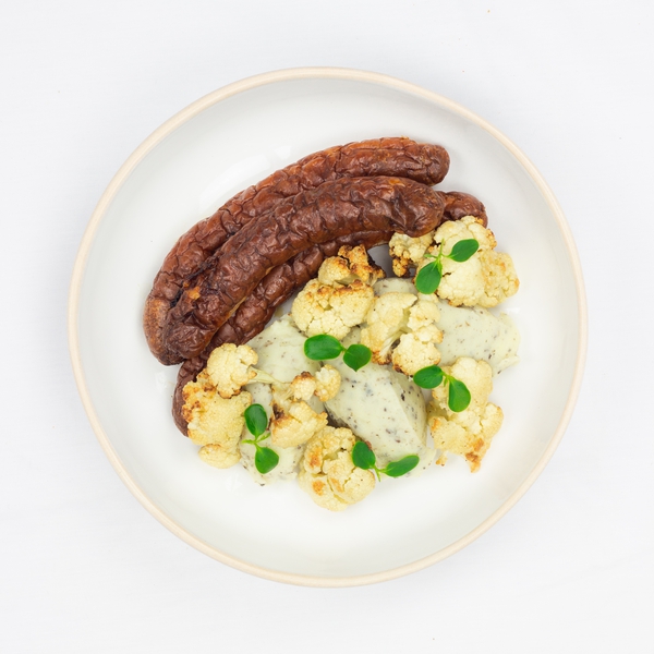 Chipolata, purée truffée et poêlées de chou-fleur et brocoli